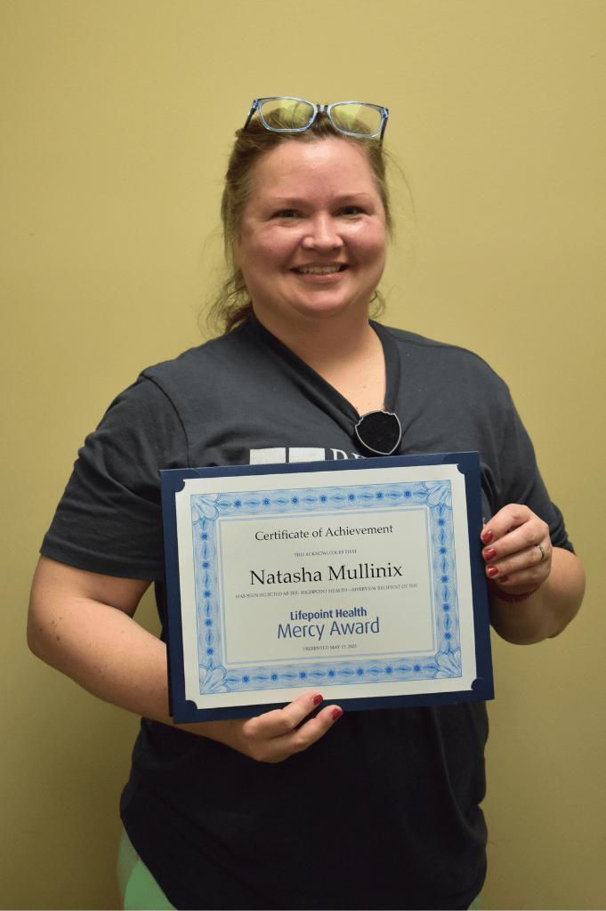 Natasha Mullinix, RN Mercy Award Winner Natasha Mullinix with Award